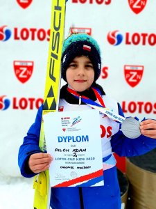 Adam Pilch z medalem i dyplomem